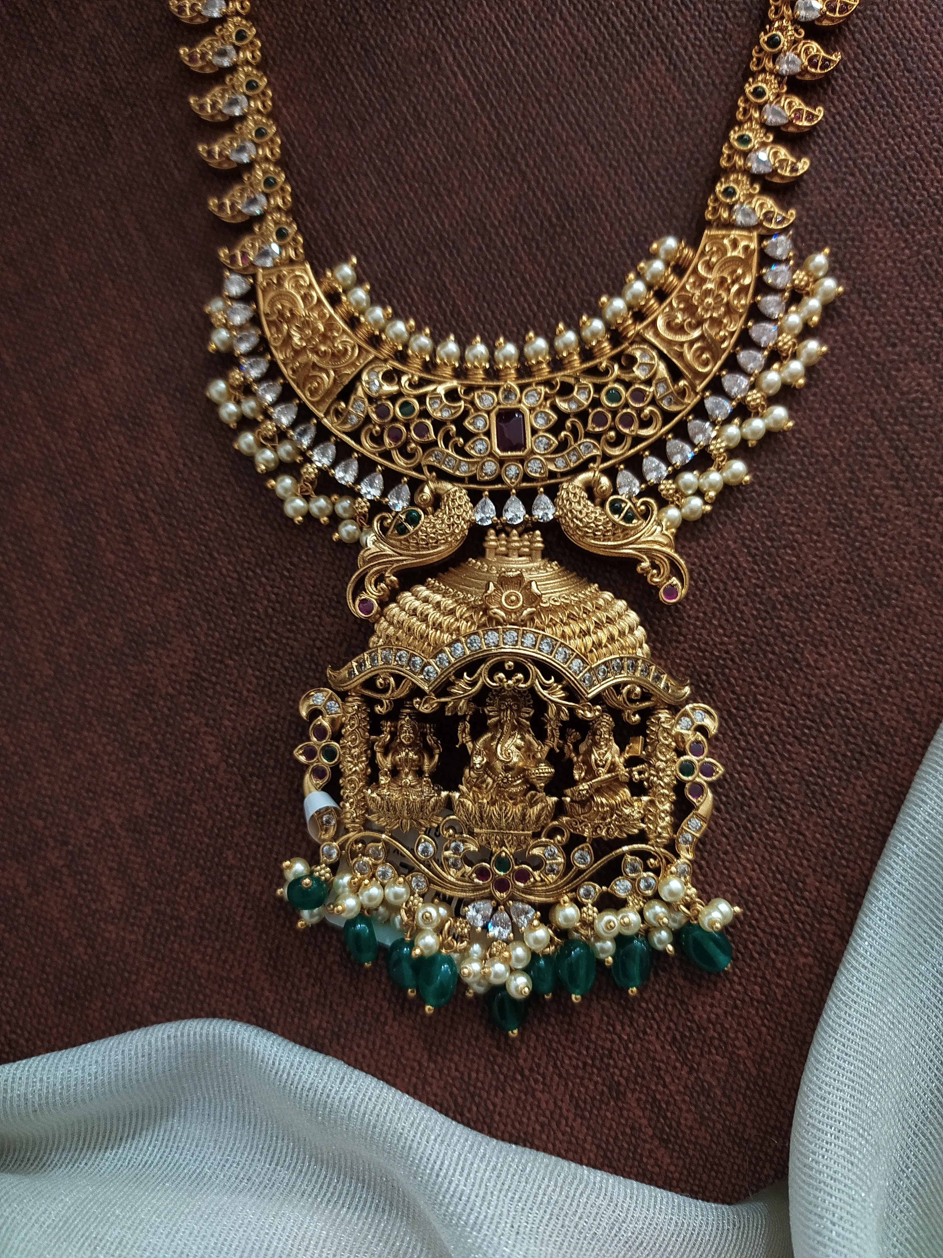 Radiant Gold-Plated Lakshmi Long Haram Set with Half-Moon Pendant